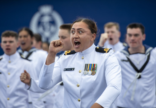 Sub Lieutenant Tyler Simeon performs a haka alongside other graduates